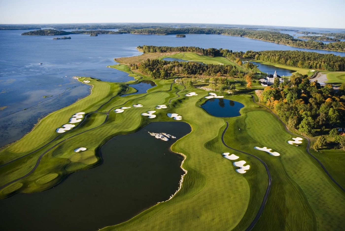 Aerial view of Bro Hof Slott golf course on the shore of Lake Mälaren